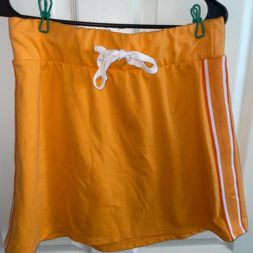 orange mini skirt